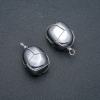 Pendente in intreccio argentato di ematite, diametro 30x22 mm+