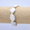 Bracciale elastico con perle barocche, diametro 22x15 mm ±, lunghezza 18 cm ±