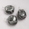 Ciondolo in labradorite con intreccio argentato, diametro 35×20 mm+