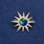 Spilla «Stella» metallo dorato, smalto e strass 32 mm +