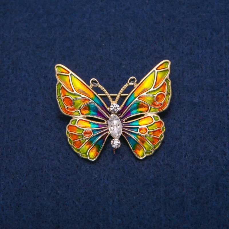 Spilla farfalla con cristalli bianchi e smalto multicolore, metallo dorato 31×37 mm
