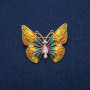 Spilla farfalla con cristalli bianchi e smalto multicolore, metallo dorato 31×37 mm
