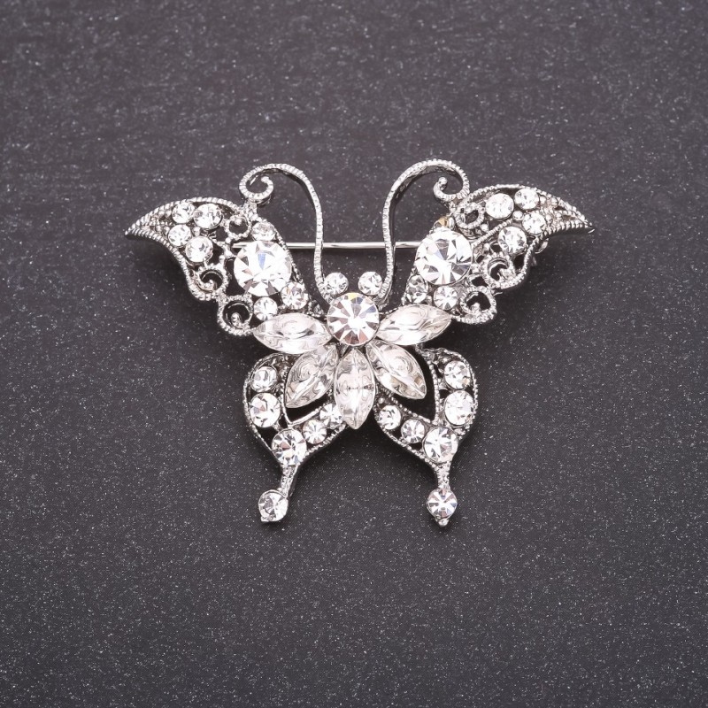 Spilla farfalla con strass bianchi 40×50 mm in metallo bianco