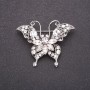 Spilla farfalla con strass bianchi 40×50 mm in metallo bianco
