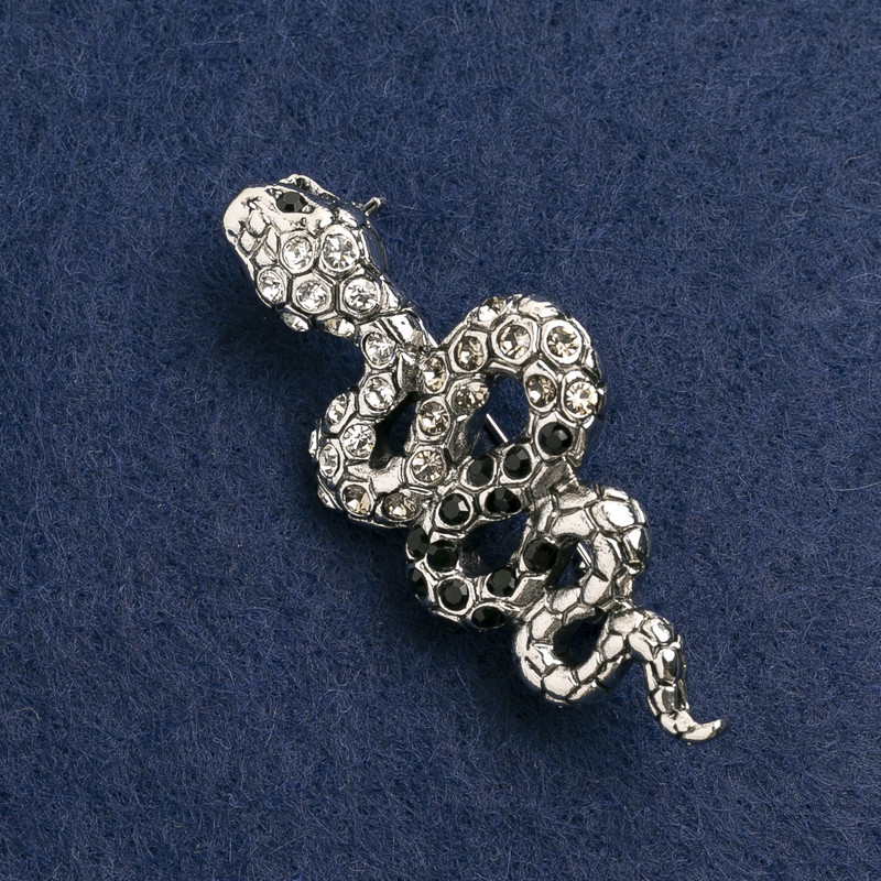 Spilla «Serpente» con strass bianchi e neri, metallo argentato scuro 55×25 mm