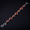 Saldo. Bracciale in Avventurina «Sabbia dorata» montatura a dentino con sette pietre ovali, 20×16 mm e 13×16 mm, lunghezza 18–21 cm