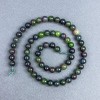 Perline di Zoisite sferiche lisce, diametro 6,5 mm ± su filo, lunghezza 37 cm+