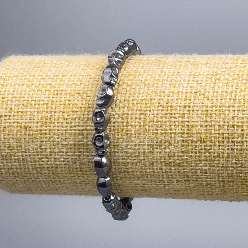 Bracciale Ematite Teschio, diametro 6×8×6 mm ±, lunghezza 18 cm (elastico)