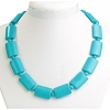 Collana turchese azzurro con pietre rettangolari 18×25 mm ± e perline tra di esse, lunghezza 49 cm+