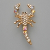 Spilla-pendente Scorpione con strass bianchi e strass cangianti, metallo dorato 28×54 mm